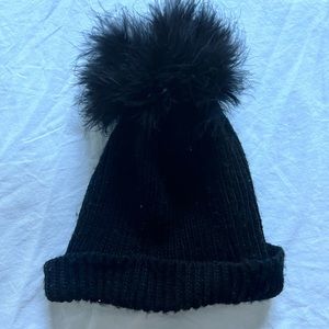 Express black beanie with feather puff — one size, stretchy